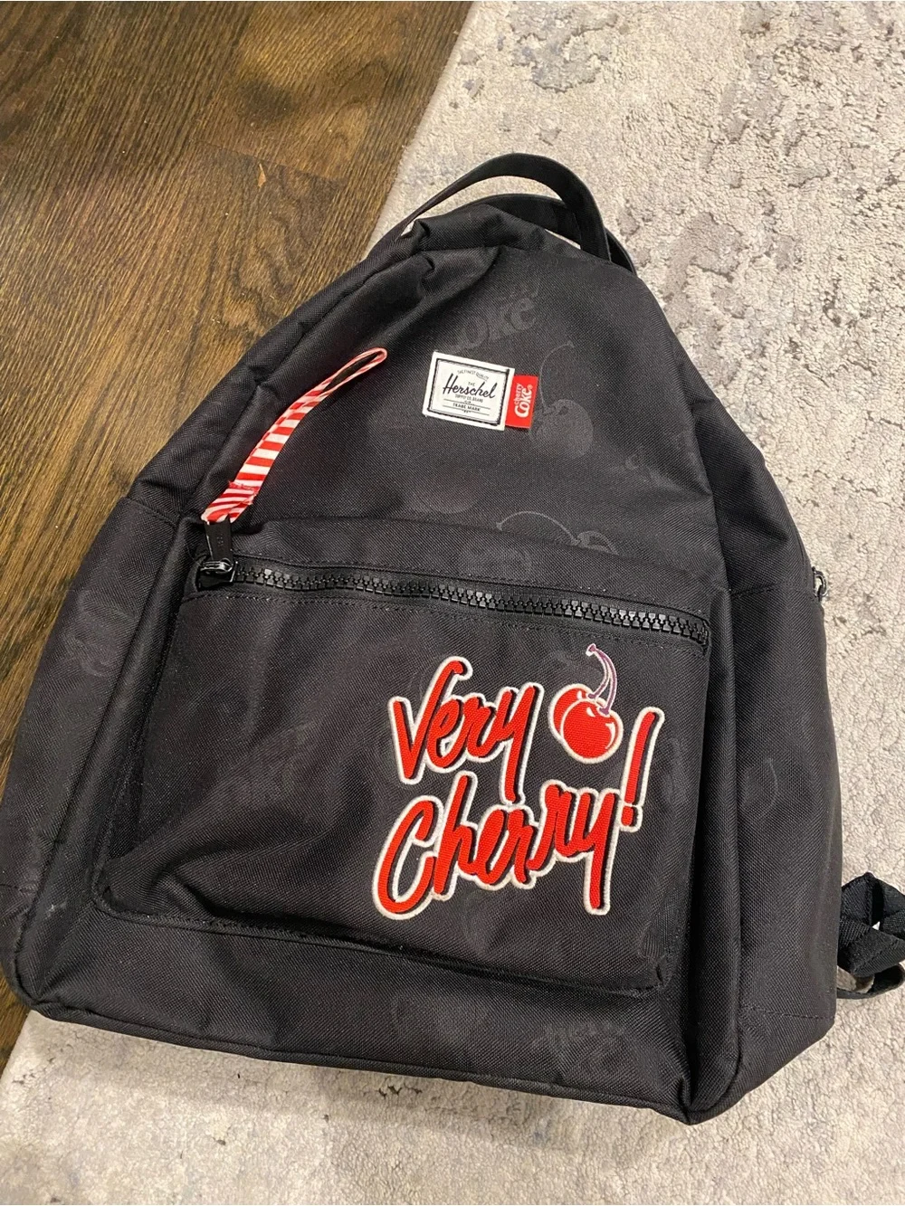 Herschel Supply Company Black Mini Backpack with Red Cherry Coke Tag